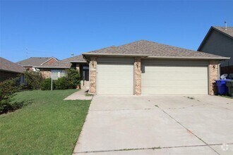 Building Photo - 512 Woodsong Dr