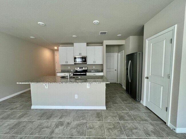 Foto del edificio - Gorgeous Brand New 3/2.5 Townhome