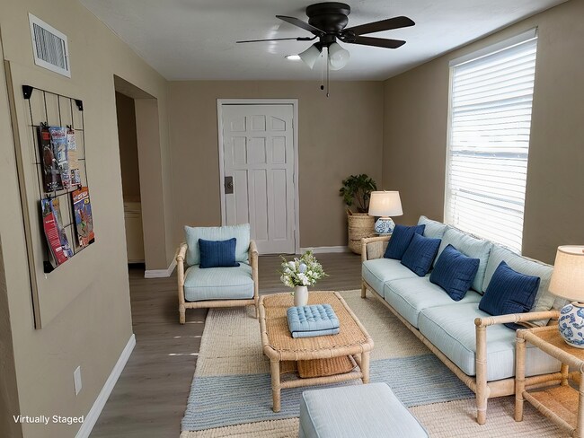 Florida room, virtually staged - 2451 Canadian Way