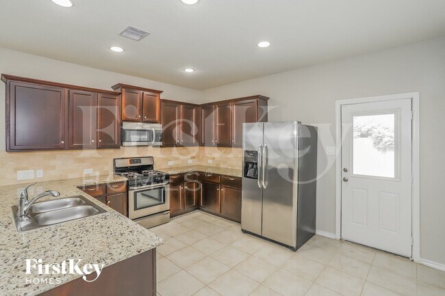 Building Photo - 8115 Lemongrass Ave