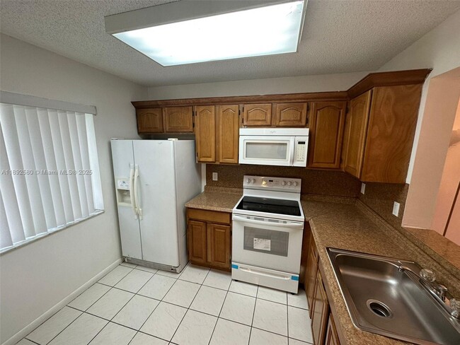 Building Photo - 8560 N Sherman Cir