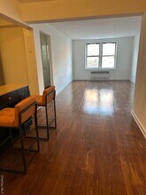 Building Photo - 90-10-90-34 34th Ave