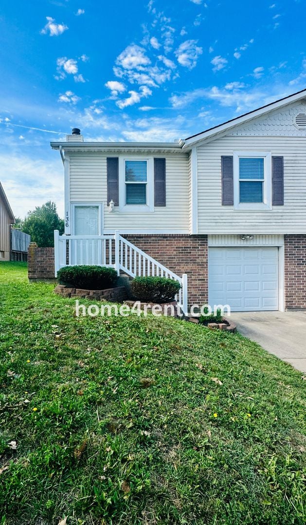 Building Photo - Updated Kitchen, Composite Deck and Refrig...