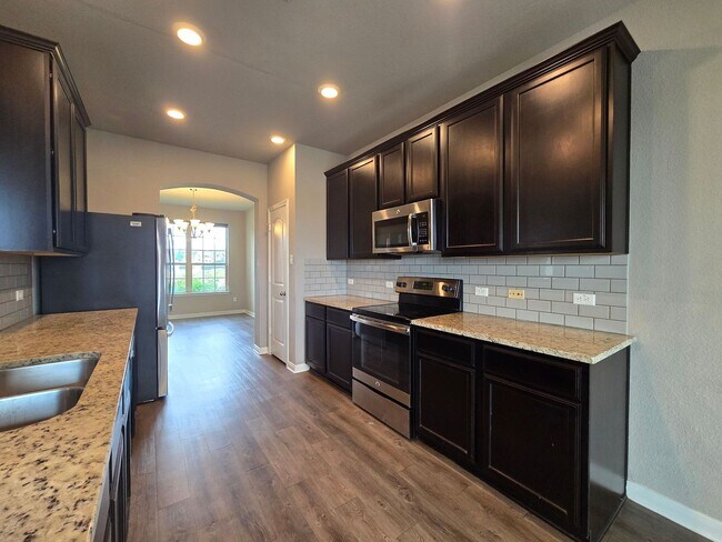 Building Photo - LARGE RENT REDUCTION - AVAILABLE NOW!