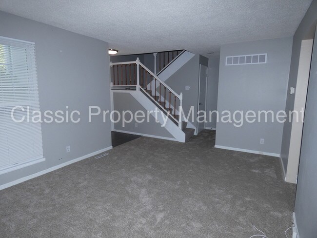 Building Photo - Great Location Townhome- 8037 N Harrison Lane