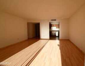 Building Photo - 7870 E Camelback Rd