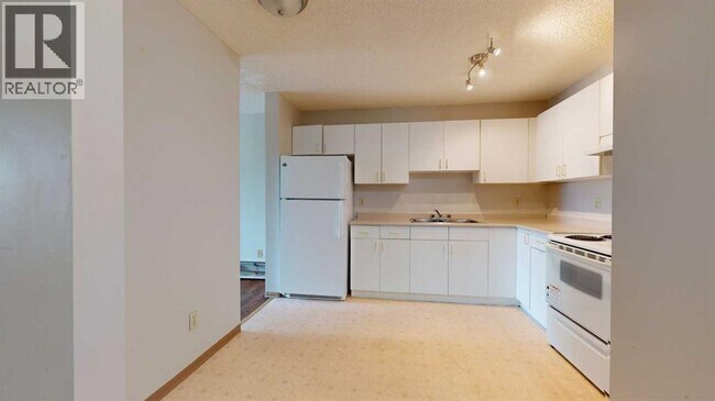 Photo du bâtiment - 5117-5144 44 St