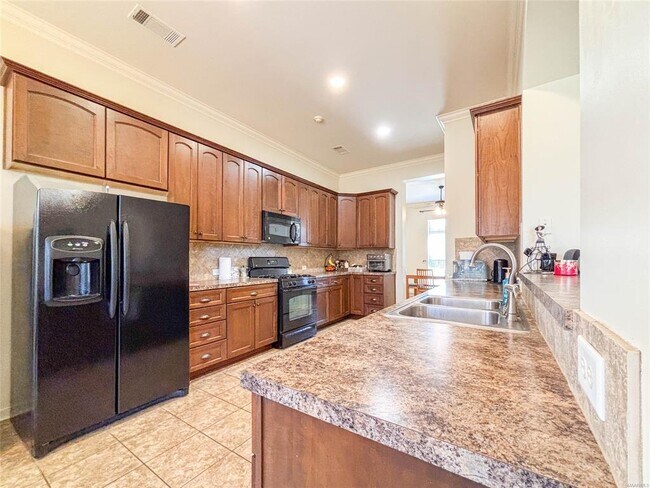 Foto del edificio - 9008 Black Cherry Trl