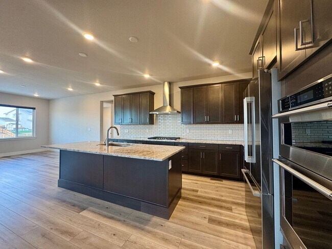 Building Photo - Stunning 5-Bedroom Home with Theater Room & Upgrades – Commerce City