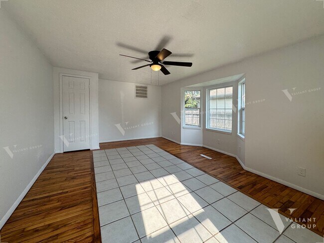 Building Photo - Spacious 4-Bed, 2-Bath in the Heart of the...