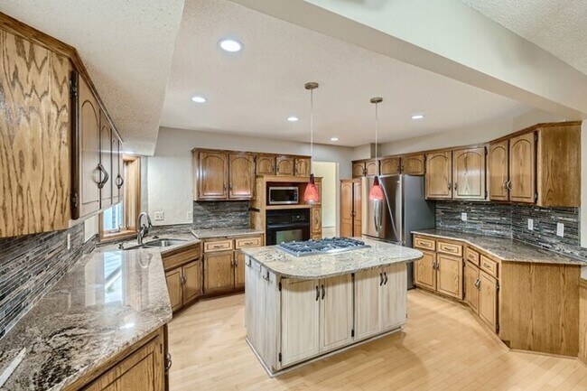 Foto del edificio - 9049 Moorland Chase, Brooklyn Park, MN, 55443