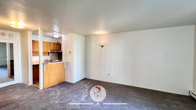 Building Photo - Lovely Studio with Walk Out patio includes...