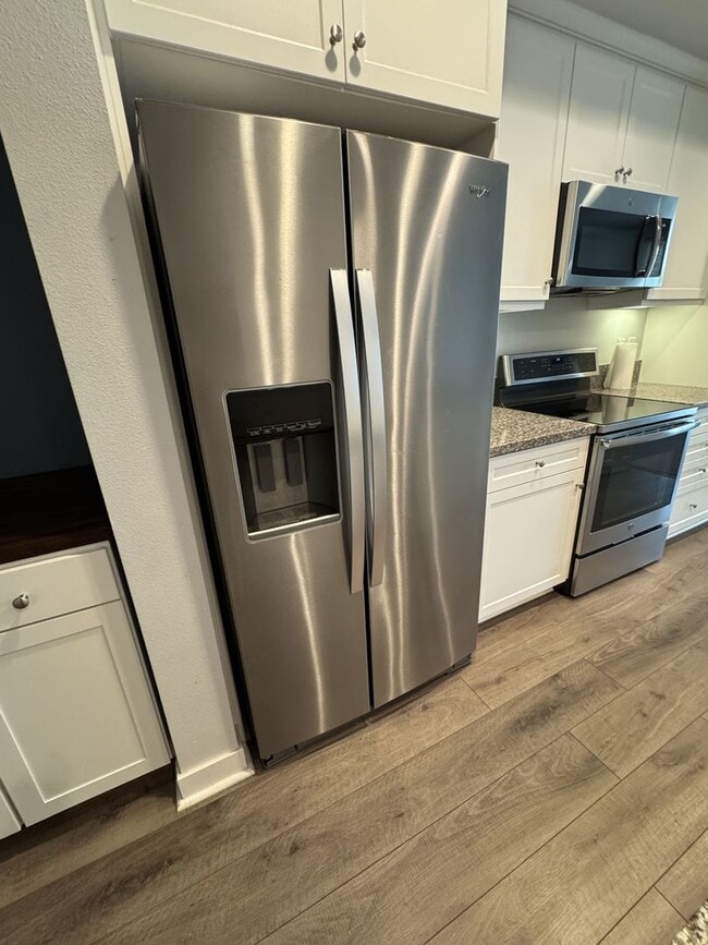 Building Photo - Gorgeous 3bdrm/3ba 2018 build condo...