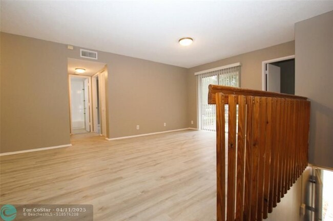 Building Photo - 704 Gardens Dr