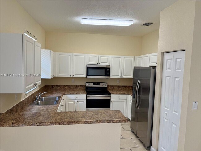 Building Photo - 13224 SW 128th Path