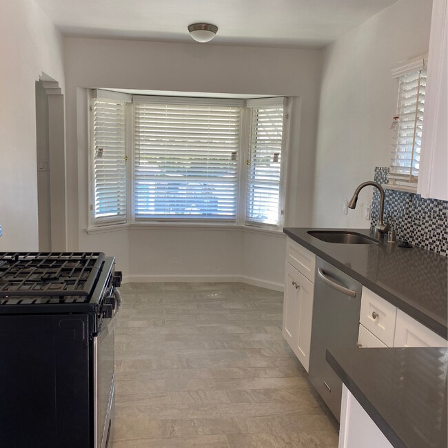 Kitchen + dining - 1155 N Genesee Ave