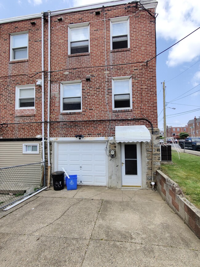 Garage Door + Back entrance - 6655 Akron St