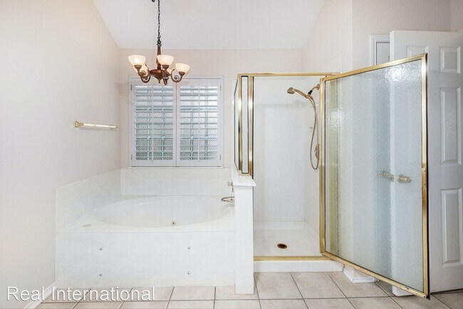 Foto del edificio - 4 br, 3 bath House - 1801 Castleguard Way