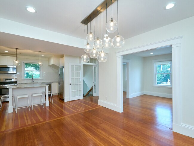 Stairs into second floor unit, open floor plan - 63 PARKER STREET