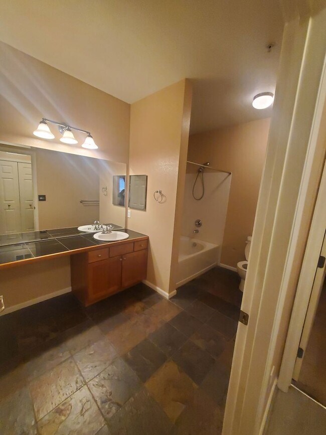 Building Photo - Spacious 2B/2B Main Level Condo With Garage NOW AVAILABLE