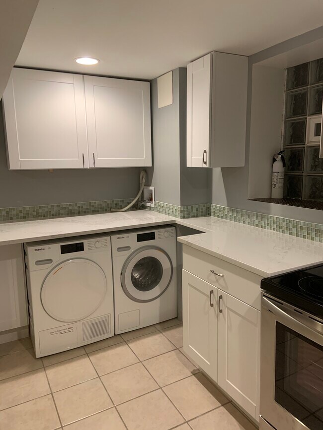 washer and dryer - 1126 E 44th St