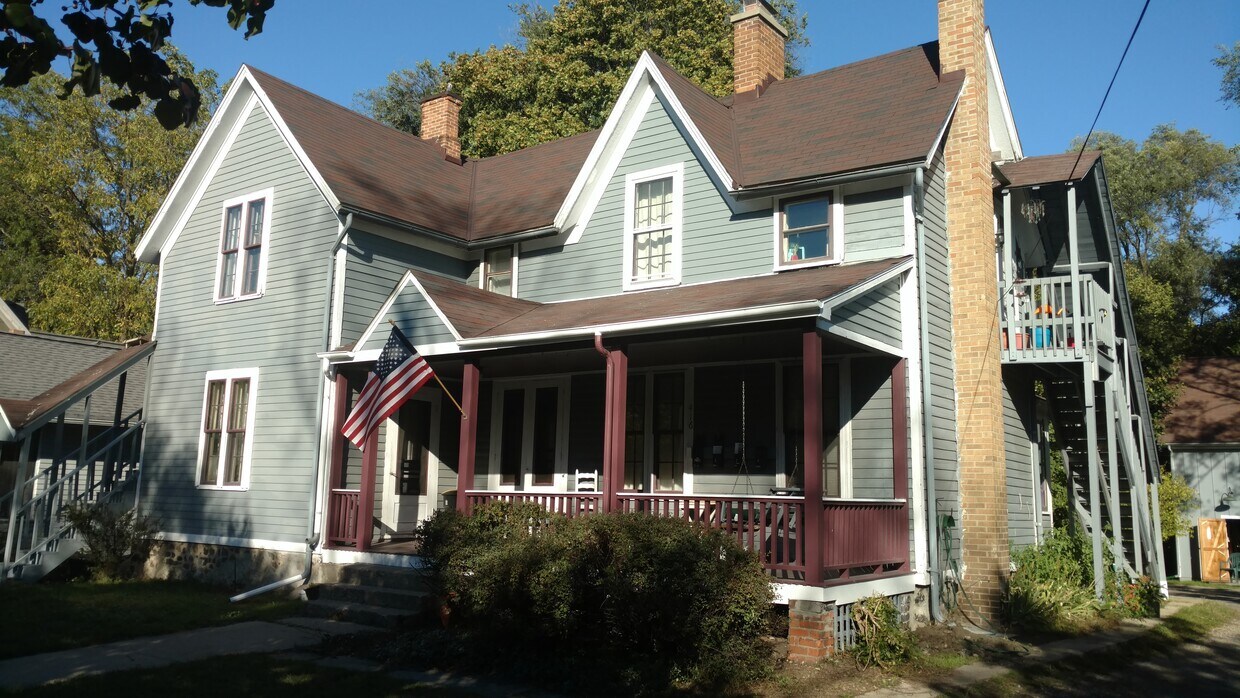 Front of four-unit house. This apartment is behind the three windows above the front porch. - 416 N Huron St