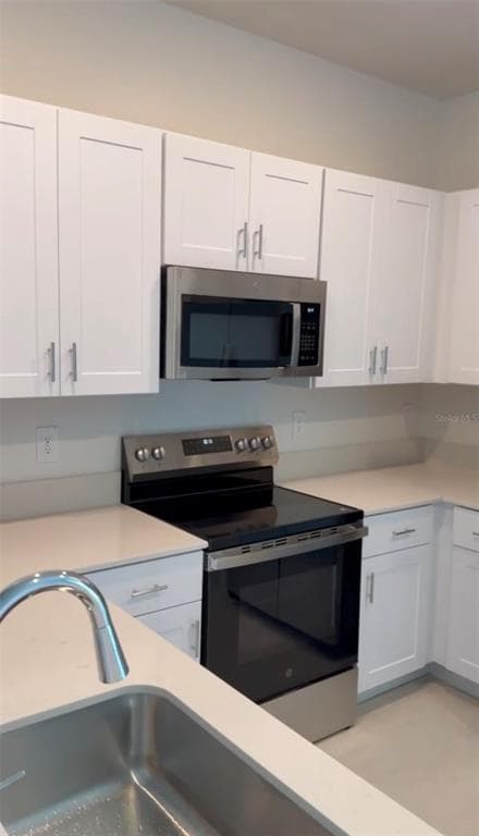 Building Photo - 10911 65th Ter E