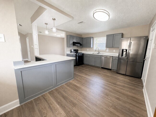 Foto del edificio - 10806 Parkland Woods Dr