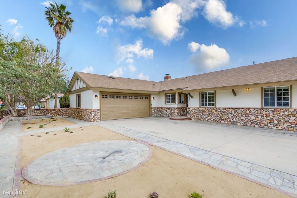 Foto principal - 4 br, 2.5 bath House - 2724 East Jackson A...