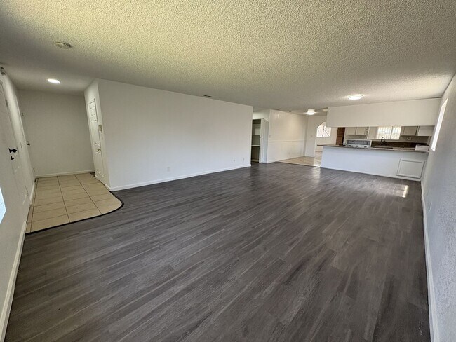 Building Photo - Large Living Area, rear yard has RV Access!