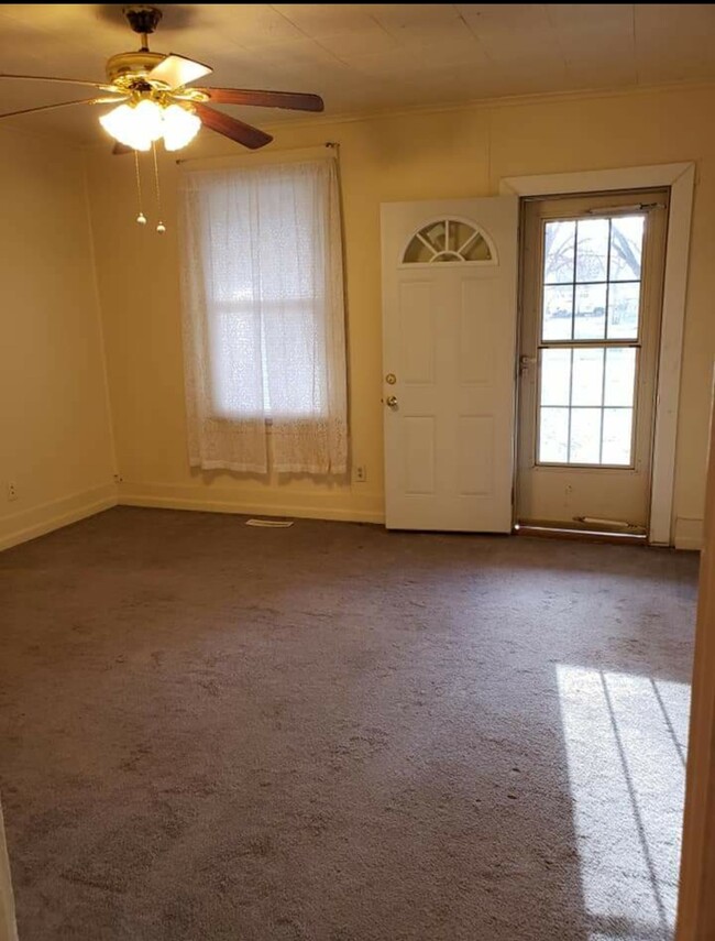 Living room from kitchen - 506 S Main St
