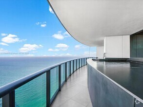 Building Photo - 18555 Collins Ave