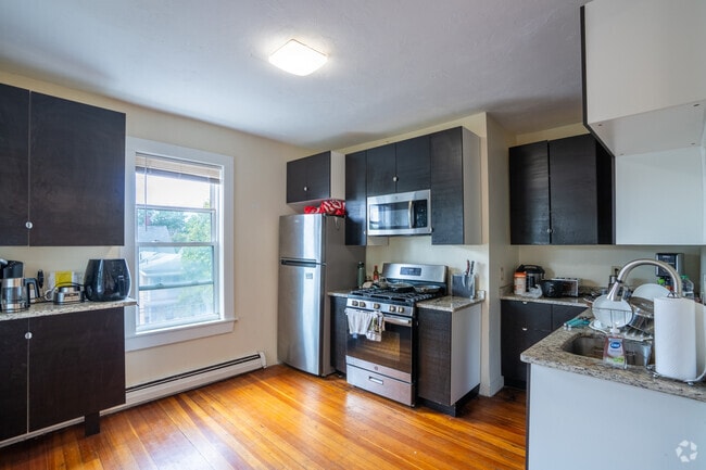 3BR, 1 BA + Office - 800SF - Kitchen - 64-66 Pleasant Street