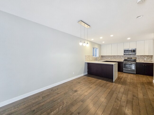 Building Photo - 61-30 30 Ave SW