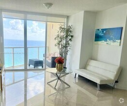 Building Photo - 16699 Collins Ave