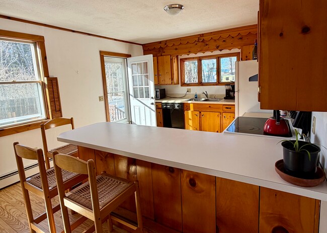 Cocina con puerta que da a la terraza. - 34 Boody St