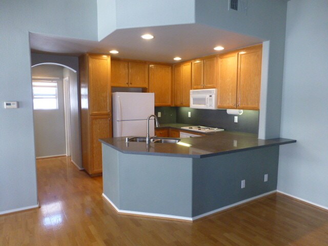 new kitchen countertop, faucet, refrig, etc - 11902 Cypress Canyon Rd