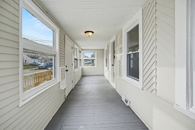 Building Photo - Updated First-Floor 2BR with Garage Parking and On-Site Laundry