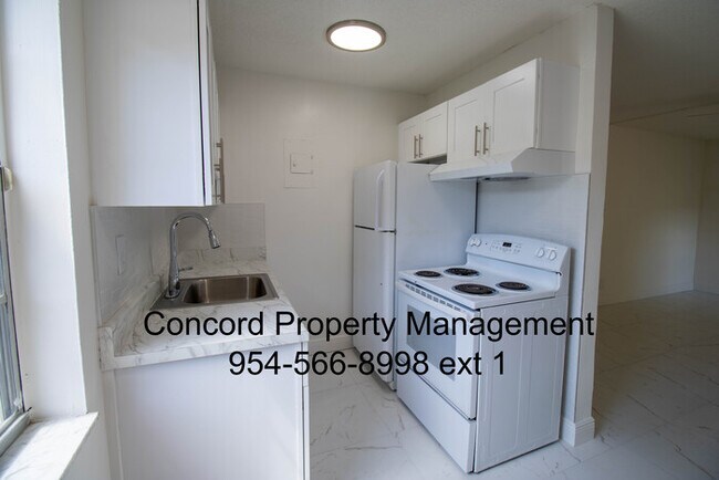 Building Photo - MAY FREE! Beautiful 2/1 with Brand New Flo...