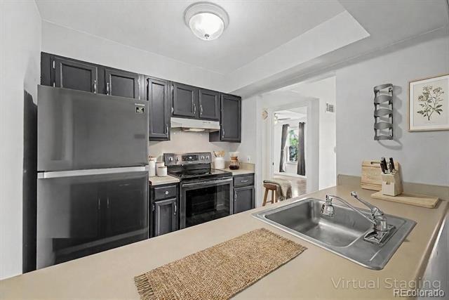 Foto del edificio - 7665 E Eastman Ave