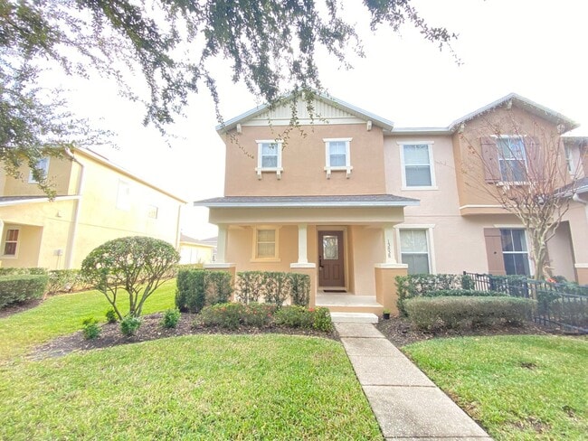 Building Photo - Avalon Park corner end Townhome featuring 3 bedrooms, 2.5 baths, plus office, and 2 car garage.