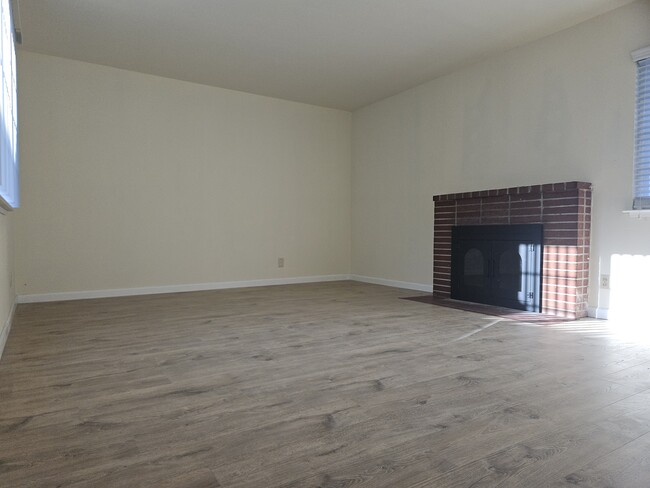 Huge living room with a fireplace - 328 E Eaglewood Ave