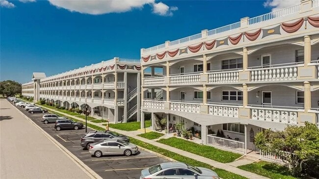 Assigned parking spot in located in front of condo - Elevator is located in center of building - 2460 Franciscan Dr