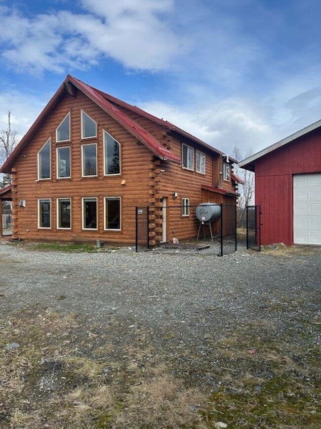 Building Photo - Gorgeous Log Home with infloor heat.  Two level lots with RV parking and dumpstation.