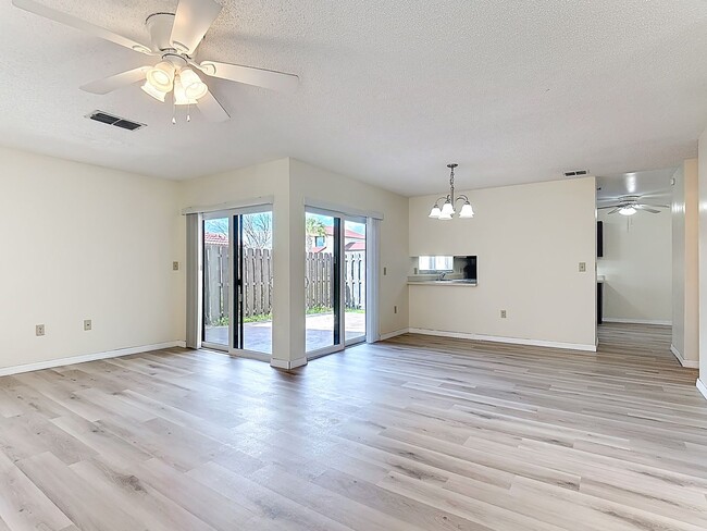 Building Photo - Spanish-Style 3 Bedroom, 2.5 Bath Mediterranean Rooftop Townhouse – Basic Cable & Wi-Fi Included!