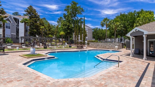 Whether you’re catching rays or enjoying poolside conversation, our expansive sundeck is the perfect place to unwind. - The Oasis at 1800