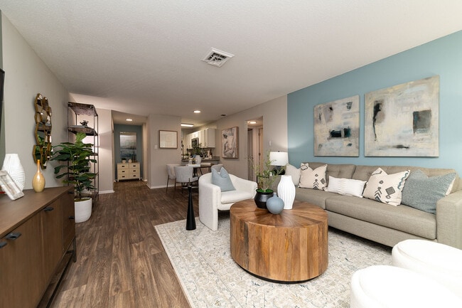 Spacious living room with hardwood-style flooring - Vetra West Hills