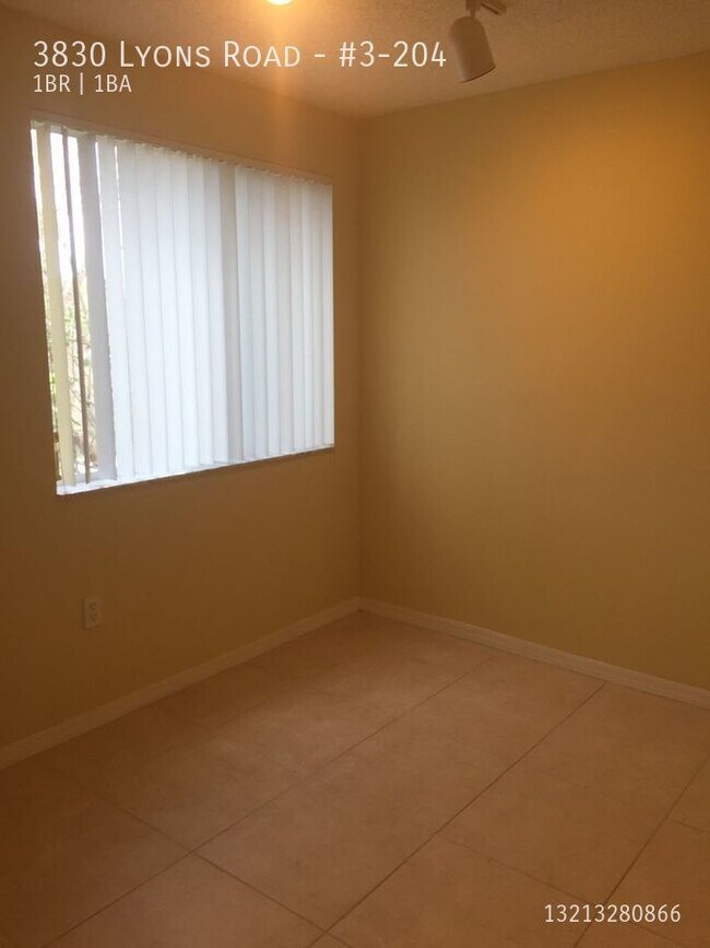 Building Photo - 1/1 condo with Lake View in Riviera Palms