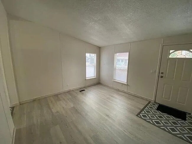Building Photo - Charming 3 Bedroom Home in Quiet, Tree Lined Neighborhood