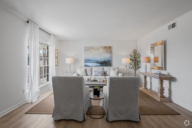 2BR, 1BA - 990SF - Living Room - Chateau Orleans Apartments